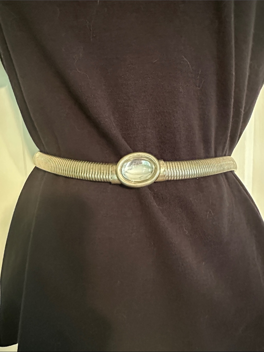 Vintage 80s silver metallic stretch snake belt with an oval cabochon center